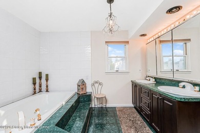 Welcome to 699 Ionia Avenue, a stunning brick-front center hall - photo 32