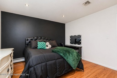 Welcome to 699 Ionia Avenue, a stunning brick-front center hall - photo 36
