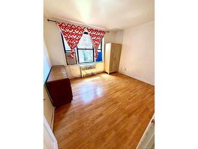 This exceptional coop apartment features a spacious 1-bedroom - photo 3