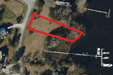 This beautifully groomed waterfront home site on Smith Creek is - photo 2