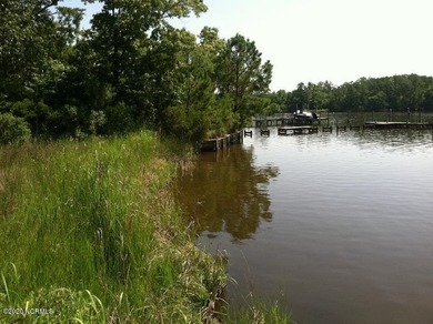 This beautifully groomed waterfront home site on Smith Creek is - photo 3