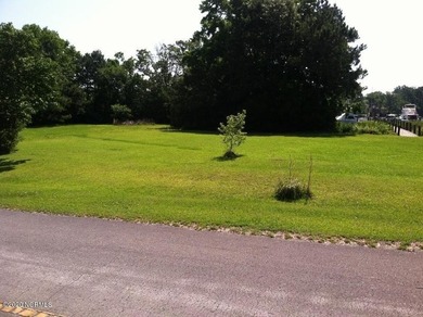 This beautifully groomed waterfront home site on Smith Creek is - photo 5