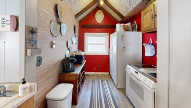 Enjoy lake life in this charming 2-bedroom, 1-bath cabin - photo 30