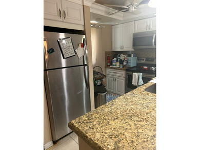 Welcome to this spacious 2-bedroom, 2-bath condo in the heart of - photo 2