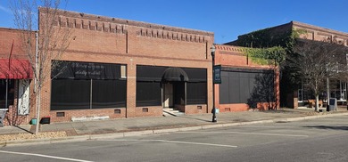 Five buildings. One opportunity. And a town quietly standing at - photo 18