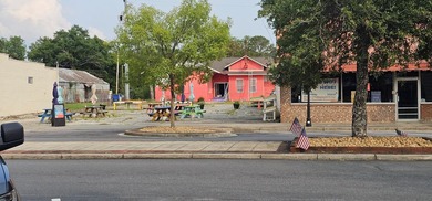 Five buildings. One opportunity. And a town quietly standing at - photo 20