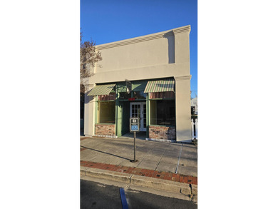 Five buildings. One opportunity. And a town quietly standing at - photo 23