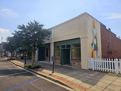 Five buildings. One opportunity. And a town quietly standing at - photo 24