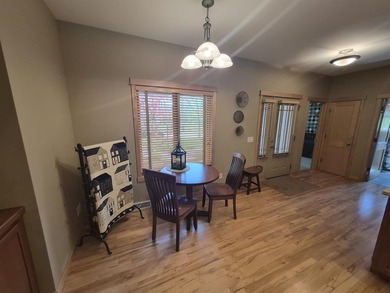 GORGEOUS COUNTRY FREE STANDING CONDO ON WOODED LOT W/WATER - photo 9