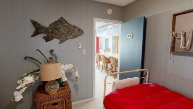 Enjoy lake life in this charming 2-bedroom, 1-bath cabin - photo 11