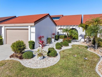 SIGNIFICANT PRICE ADJUSTMENT! Welcome to your DREAM villa! This - photo 2