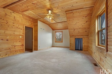 Welcome to this beautiful waterfront log home tucked away on a - photo 16
