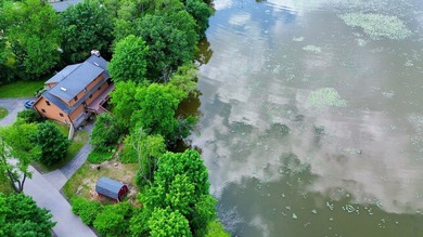 Welcome to this beautiful waterfront log home tucked away on a - photo 31