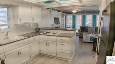 Discover refined lakeside living in this impeccably maintained - photo 18
