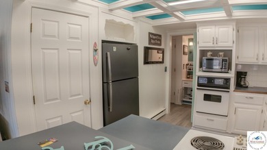 Discover refined lakeside living in this impeccably maintained - photo 22