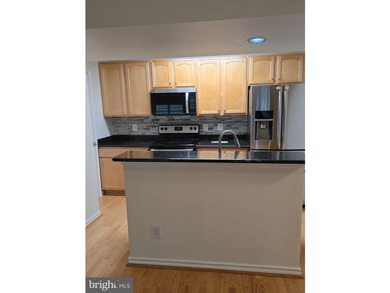 Discover the charm of Penderbrook Square Condominiums, where - photo 9