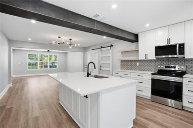 THE PROPERTY IS FULLY REMODELED! Beautiful 4 bedroom, 2 bath - photo 5