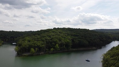 Welcome to The Cove, a brand new gated lakefront community on - photo 7