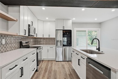 THE PROPERTY IS FULLY REMODELED! Beautiful 4 bedroom, 2 bath - photo 8