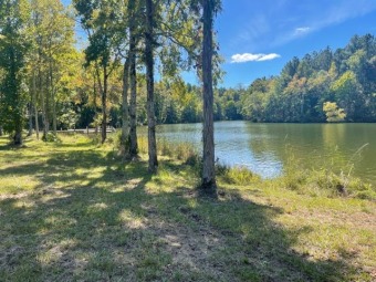 This beautiful CLEARED, DOCKABLE lakefront lot with public water - Lake Lot For Sale in Ninety Six, South Carolina