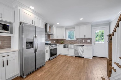 Welcome to this beautifully renovated Colonial in the heart of - photo 3