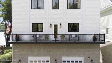 Experience elevated riverfront living in this striking - photo 4