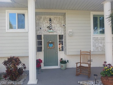 Discover this charming waterfront home located in the heart of - photo 5