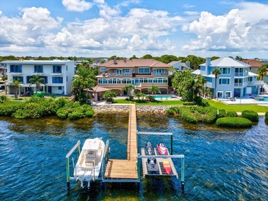 Welcome to an extraordinary waterfront estate in the prestigious - photo 2