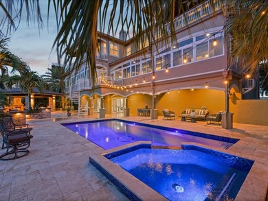 Welcome to an extraordinary waterfront estate in the prestigious - photo 3