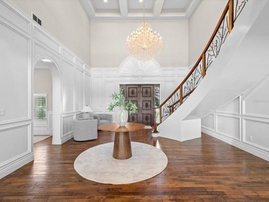 Welcome to an extraordinary waterfront estate in the prestigious - photo 6