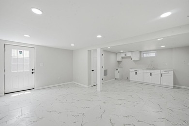 Welcome to 64 Cedar Drive, Bay Shore, NY 11706. This beautifully - photo 24