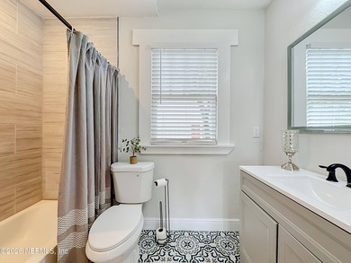 Timeless Riverside charm meets modern luxury in this beautifully - photo 37