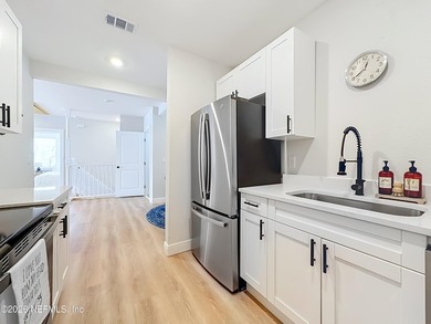 Timeless Riverside charm meets modern luxury in this beautifully - photo 42
