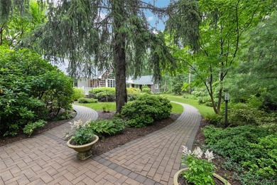 Nestled on 2.4 secluded acres in the prestigious Village of Old - photo 3