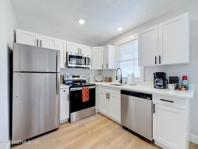 Timeless Riverside charm meets modern luxury in this beautifully - photo 48