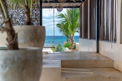 This beach house is absolutely amazing! Located in a beautiful - photo 33