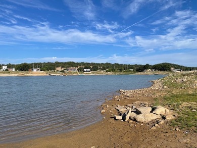Looking for lakefront property? This beautiful 0.90-acre - photo 3