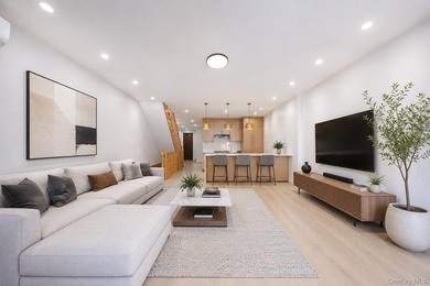 Welcome to this beautifully renovated two family home in the - photo 11