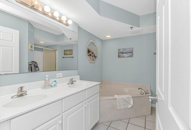 Experience the pinnacle of coastal living in this exquisite