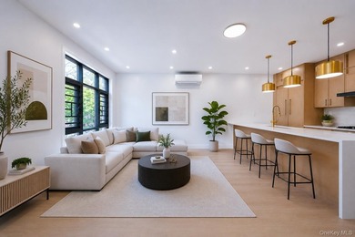 Welcome to this beautifully renovated two family home in the - photo 13