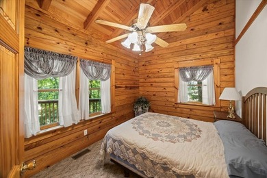 Peace and quiet and beauty surround this Honest Abe log home - photo 18