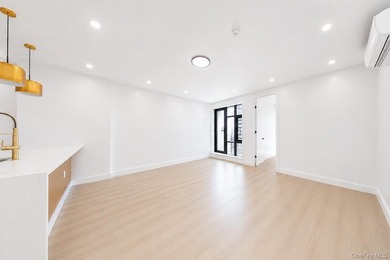 Welcome to this beautifully renovated two family home in the - photo 23