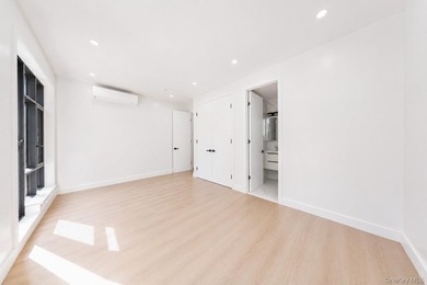 Welcome to this beautifully renovated two family home in the - photo 29