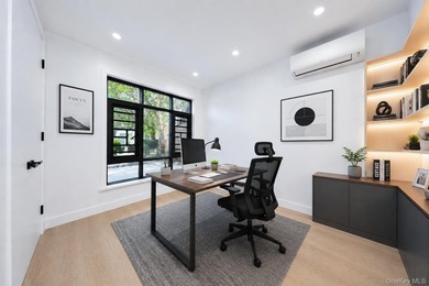 Welcome to this beautifully renovated two family home in the - photo 31