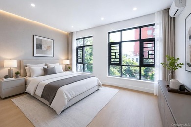 Welcome to this beautifully renovated two family home in the - photo 33