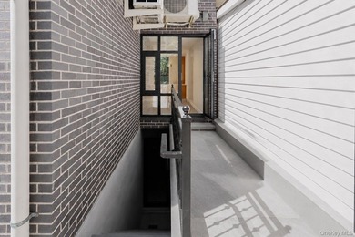 Welcome to this beautifully renovated two family home in the - photo 34
