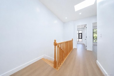 Welcome to this beautifully renovated two family home in the - photo 36