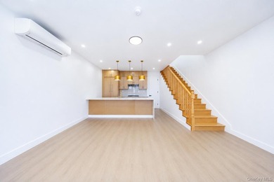 Welcome to this beautifully renovated two family home in the - photo 41