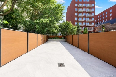 Welcome to this beautifully renovated two family home in the - photo 43