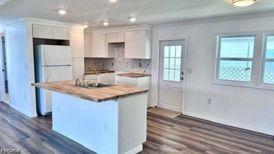 Welcome to the highly sought-after 55+ gated waterfront - photo 1
